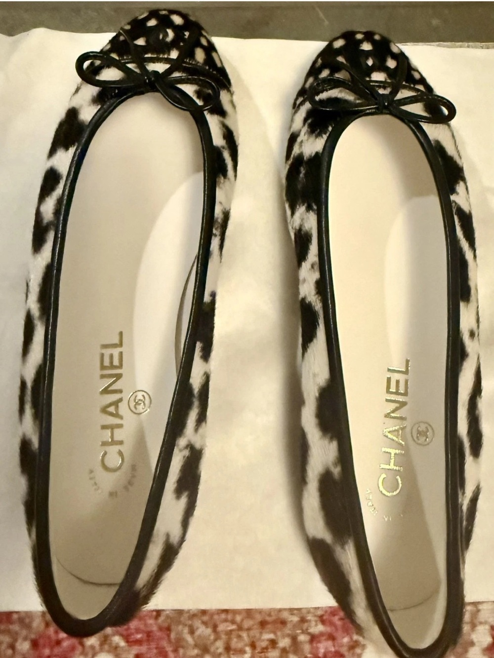 CHANEL Black & White Calf Hair Ballet Flats with Leather Bow